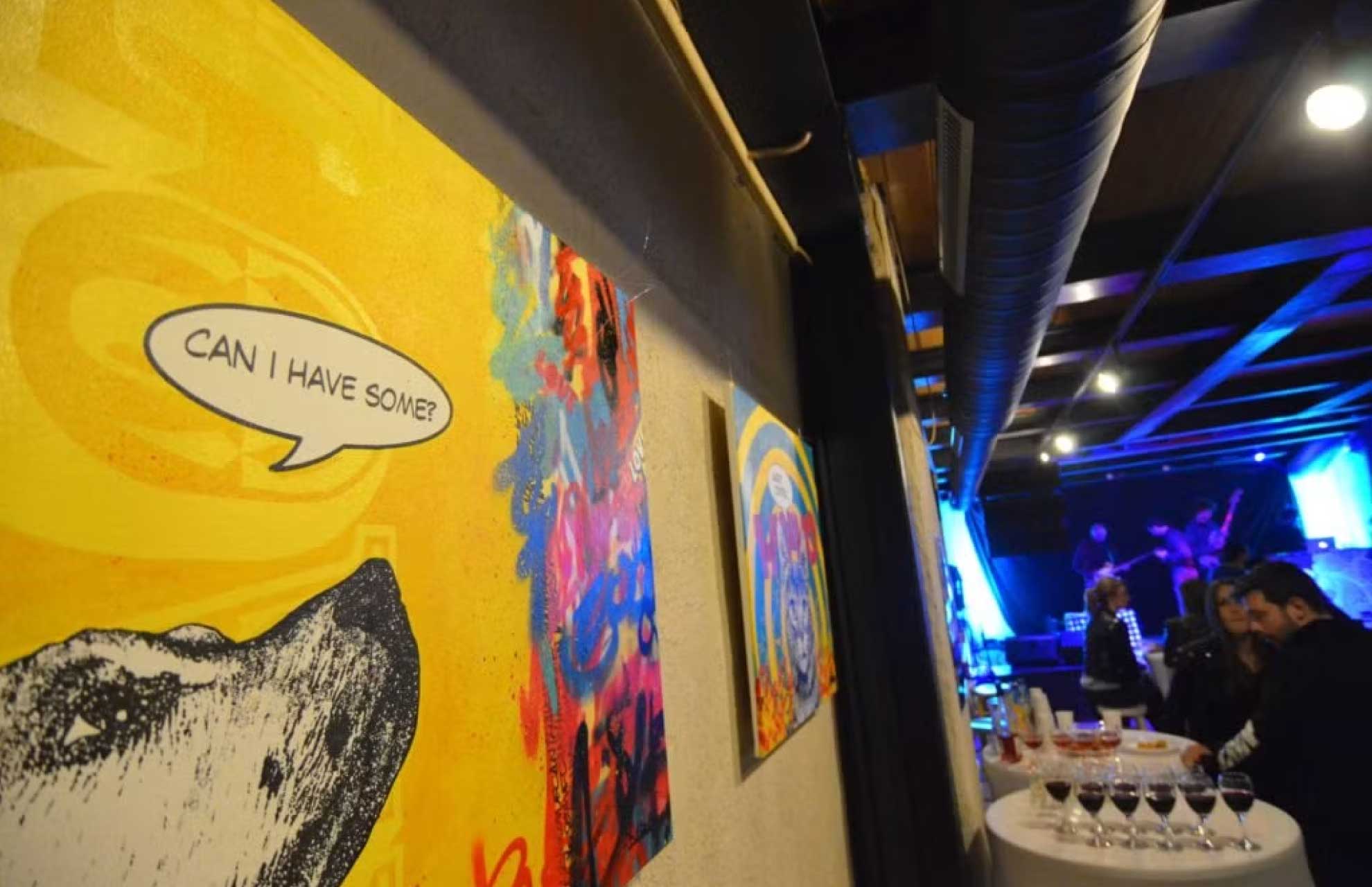 Studio Daboo paintings on a wall during an exhibition in Šibenik Croatia